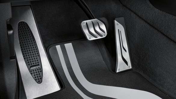 BMW 3 Series Sedan, M Performance pedal cover. Close-up view of the BMW 3 Series Sedan with focus on the BMW M Performance pedal covers.