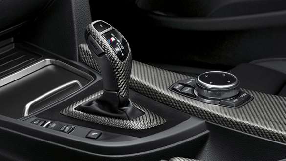 BMW 3 Series Sedan, M Performance gear lever. Close-up view of the BMW 3 Series Sedan with focus on the BMW M Performance gear lever.