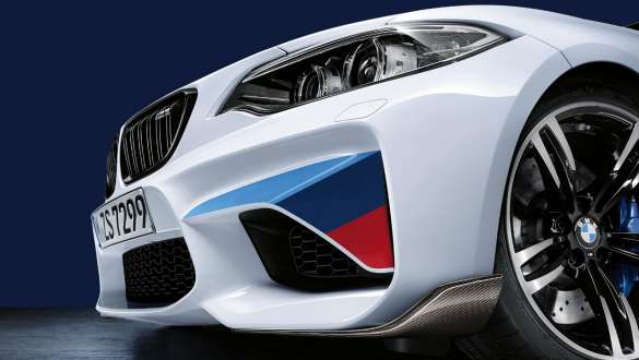 BMW 3 Series Sedan, M Performance Parts front splitters. Lateral close-up of the front of the BMW 3 Series Sedan with focus on the BMW M Performance front splitter carbon fibre.
