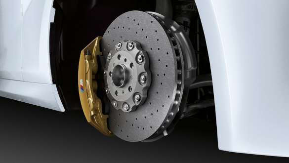 BMW 3 Series Sedan, M Performance brake system. Close-up view of the BMW 3 Series Sedan with focus on the BMW M Performance brake system.