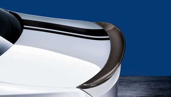 BMW 3 Series Sedan, M Performance rear spoiler. Close-up view of the BMW 3 Series Sedan with focus on the BMW M Performance rear spoiler carbon fibre.
