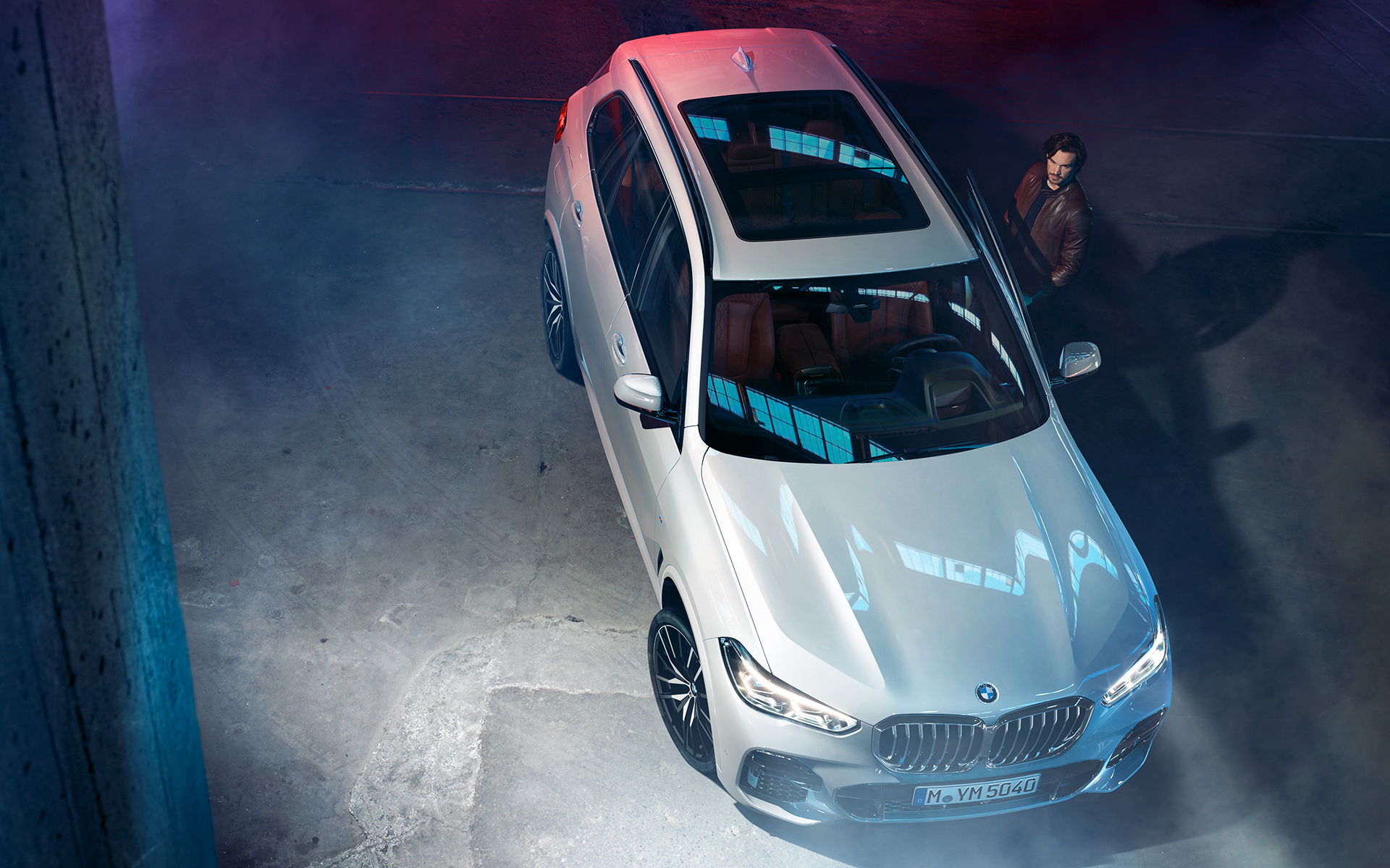 Night-time shot of the BMW X5 from above in an urban setting