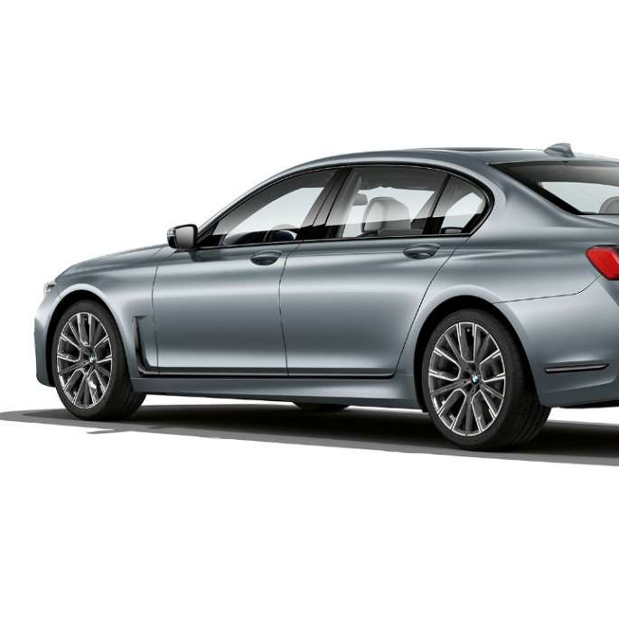 Grey BMW 7 Series Sedan M Sport package in three-quarter rear view