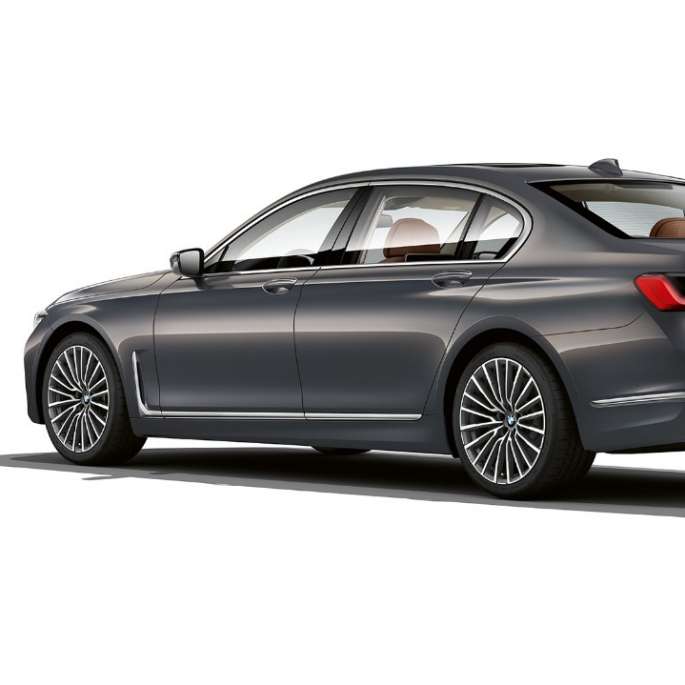 Grey BMW 7 Series Sedan with Exterior Design Pure Excellence in three-quarter rear view